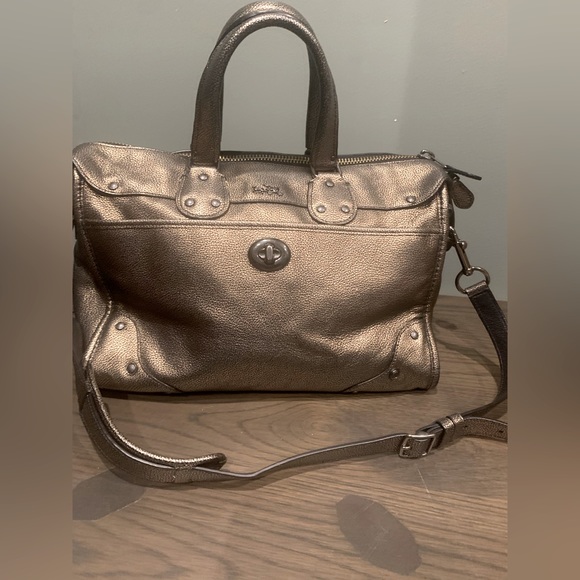 Dark Gold Coach Leather Bronze Satchel Purse
13" (L) x 9.5" (H) x 7" (W) - Picture 1 of 14